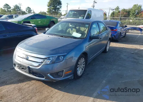 2012 Ford Fusion Hybrid z USA, uszkodzony, nr VIN 3FADP0L35CR179651